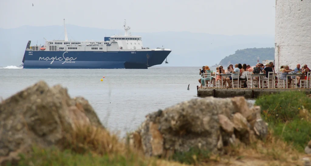 Conventional ferry arriving at a Greek island, Ferryhopper Greece